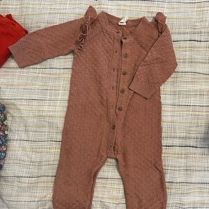 Kate Quinn pink onesie w ruffles